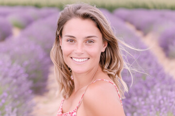 Australian woman smile wearing red sundress outdoor at lavender field