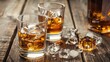 © AkuAku - Whiskey served with ice in glasses on a rustic wooden backdrop