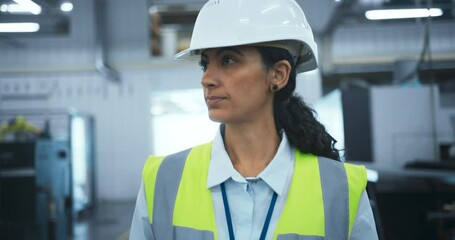 Leinwandbilder - Female Worker in a Reflective Vest and Hard Hat Walking Through a High Tech Factory, Inspecting Advanced Machinery and Monitoring Production. Overlooking Production at a Modern Automated Manufacture