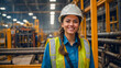 © NONTANUN - Beautiful female engineer wearing a yellow hard hat and safety vest She smiled and stood in front of many industrial pipes and complicated machines.