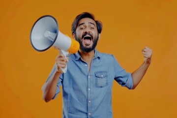 Excited young Indian man announces sale discounts with megaphone.