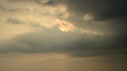 Sticker - Dramatic sky with storm cloud on a cloudy day time lapse at the ocean.