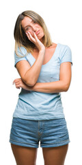 Poster - Young beautiful woman over isolated background thinking looking tired and bored with depression problems with crossed arms.