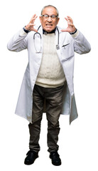 Poster - Handsome senior doctor man wearing medical coat Shouting frustrated with rage, hands trying to strangle, yelling mad