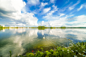 Wall Mural - Nature on the Danube dam near Ingolstadt. View of the reservoir and the surrounding landscape. Waters at the Danube barrage in Bavaria. 
