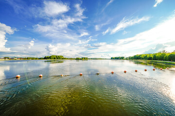 Wall Mural - Nature on the Danube dam near Ingolstadt. View of the reservoir and the surrounding landscape. Waters at the Danube barrage in Bavaria. 
