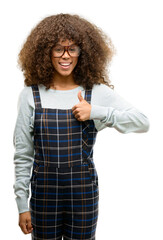 Poster - African american woman wearing a retro style happy with big smile doing ok sign, thumb up with fingers, excellent sign