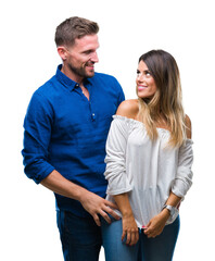 Canvas Print - Young couple in love over isolated background looking away to side with smile on face, natural expression. Laughing confident.