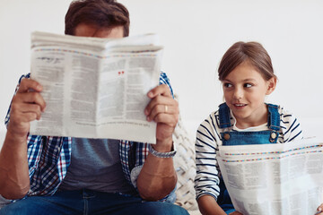 Poster - Father, daughter and reading newspaper on sofa in home with smile, learning or update for global event. Man, dad and child with press, media and check for headlines, story or bonding in family house