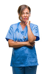 Sticker - Middle age senior nurse doctor woman over isolated background thinking looking tired and bored with depression problems with crossed arms.