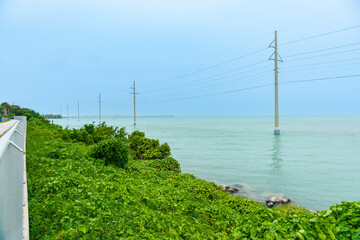 Canvas Print - Power transmission lines across water along Highway 1 through Florida Keys.