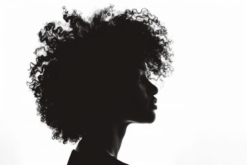 African American black woman silhouette portrait against white studio background.