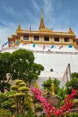 Wall Mural - The famous Buddhist temple on the top of the mountain with a beautiful garden. The Golden Mount or Wat SaKet temple in Bangkok