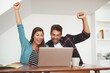© StarDweller/peopleimages.com - Happy, couple and laptop for success in house celebration of loan approval, financial freedom and debt payment. Excited, man and woman with digital for email, good news and investment achievement