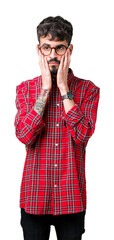 Canvas Print - Young handsome man wearing glasses over isolated background Tired hands covering face, depression and sadness, upset and irritated for problem