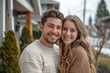 © ActionGP - A joyful couple smiling happily while standing outside in a suburban neighborhood. Captured in natural light. Generated AI