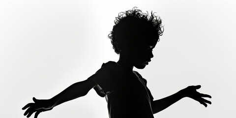 Wall Mural - dark silhouette of unrecognizable boy on a white background