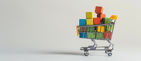 Wall Mural - colorful wooden blocks fill a shopping trolley on a white backdrop perfect for a copy space image