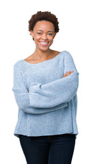 Sticker - Young beautiful african american woman wearing a sweater over isolated background happy face smiling with crossed arms looking at the camera. Positive person.