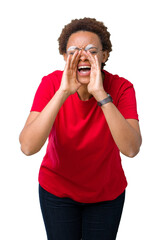 Sticker - Beautiful young african american woman wearing glasses over isolated background Shouting angry out loud with hands over mouth