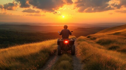 Poster - Person riding ATV on a grassy path in the hills during sunset with golden light and clouds