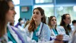 © Shozib - Young medical students in white coats attentively listening to a lecture in a well-lit university classroom