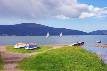 Wall Mural - Beautiful Mediterranean landscape on spring day. Montenegro, Adriatic Sea. View of coast of Bay of Kotor near Tivat city