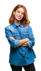 Wall Mural - Young beautiful woman over isolated background happy face smiling with crossed arms looking at the camera. Positive person.