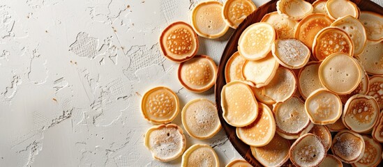 Aufkleber - Top view background of mini pancakes a menu concept for sweet breakfast or dessert with space for text showcasing a healthy organic snack serving size. with copy space image