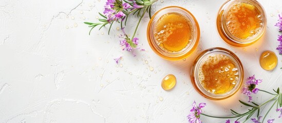 Fototapete - Delicate skincare and aromatic therapy are featured in a spa set with honey showcased in a top view white background image with copy space available