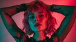 © RaptorWoman - Artistic portrait of a woman in vibrant neon red and teal lighting, creating a striking visual contrast.