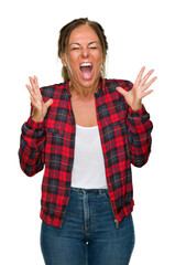 Canvas Print - Middle age adult woman wearing casual jacket over isolated background celebrating mad and crazy for success with arms raised and closed eyes screaming excited. Winner concept