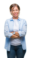 Wall Mural - Middle age senior hispanic woman over isolated background with serious expression on face. Simple and natural looking at the camera.