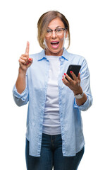 Wall Mural - middle age senior woman texting sending message using smartphone over isolated background surprised 