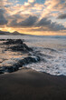 © magui RF - El Puertillo beach with high tide seascape at sunset .