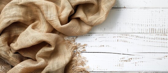 Poster - Copy space image of burlap fabric on a white wooden kitchen table