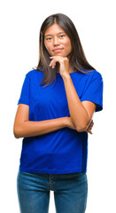 Poster - Young asian woman over isolated background looking confident at the camera with smile with crossed arms and hand raised on chin. Thinking positive.