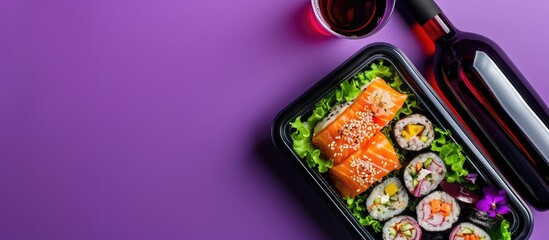 Poster - A plastic lunch box containing a delicious bento cake paired with a bottle of wine against a vibrant purple backdrop perfect for a copy space image