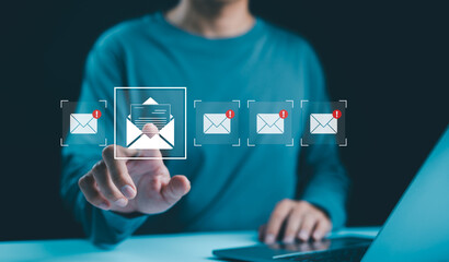 Email notification management concept. Checking digital email, A person with new email notification icons on a digital interface, email communication, messaging alerts, and online correspondence.