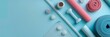 © Elmira - A flat lay of yoga equipment arranged on a light blue background. The equipment includes mats, blocks, and a rope