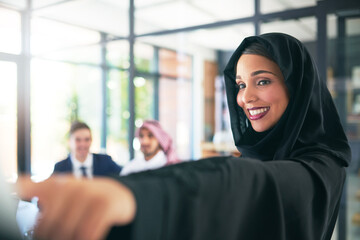 Poster - Happy, muslim woman and presentation with team in dubai project, deal or speech at office. Islamic female person, speaker or business employee with smile or hijab for coaching colleagues at workplace