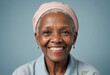 © jarntag - Portrait view of a regular happy smiling South Africa old woman, ultra realistic, candid, social media, avatar image, plain solid background