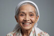© jarntag - Portrait view of a regular happy smiling Malaysia old woman, ultra realistic, candid, social media, avatar image, plain solid background