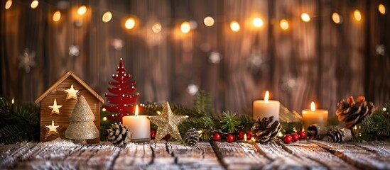 Poster - Wooden Christmas stars a New Year tree candles and a house adorned with fir branches are set against a wooden backdrop creating a cozy holiday atmosphere with a copy space image