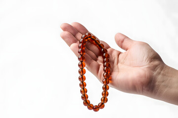 Muslim Woman's Hand with Prayer Beads