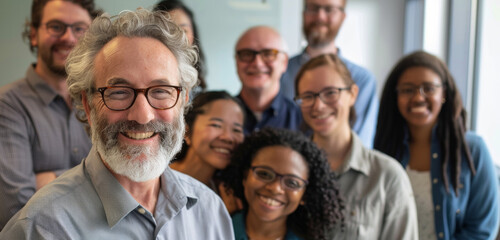 Diverse Business Team Smiles Together in Office Setting