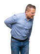 © Krakenimages.com - Middle age arab business man over isolated background Suffering of backache, touching back with hand, muscular pain