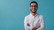 © Johannes - Smiling confident arab young man, male student, professional employee or programmer standing isolated on blue background. Happy handsome ethnic guy wearing shirt and glasses, Generative AI.