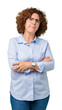 © Krakenimages.com - Beautiful middle ager senior businees woman wearing glasses over isolated background skeptic and nervous, disapproving expression on face with crossed arms. Negative person.