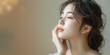 © kanpisut - Close up Asian model with a beautiful face. Cosmetology, beauty, skincare concept.